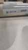 980134